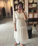 Off white pleated kurta with highlights.