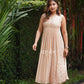 Beige pleated kurta with highlights.