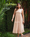 Beige pleated kurta with highlights.